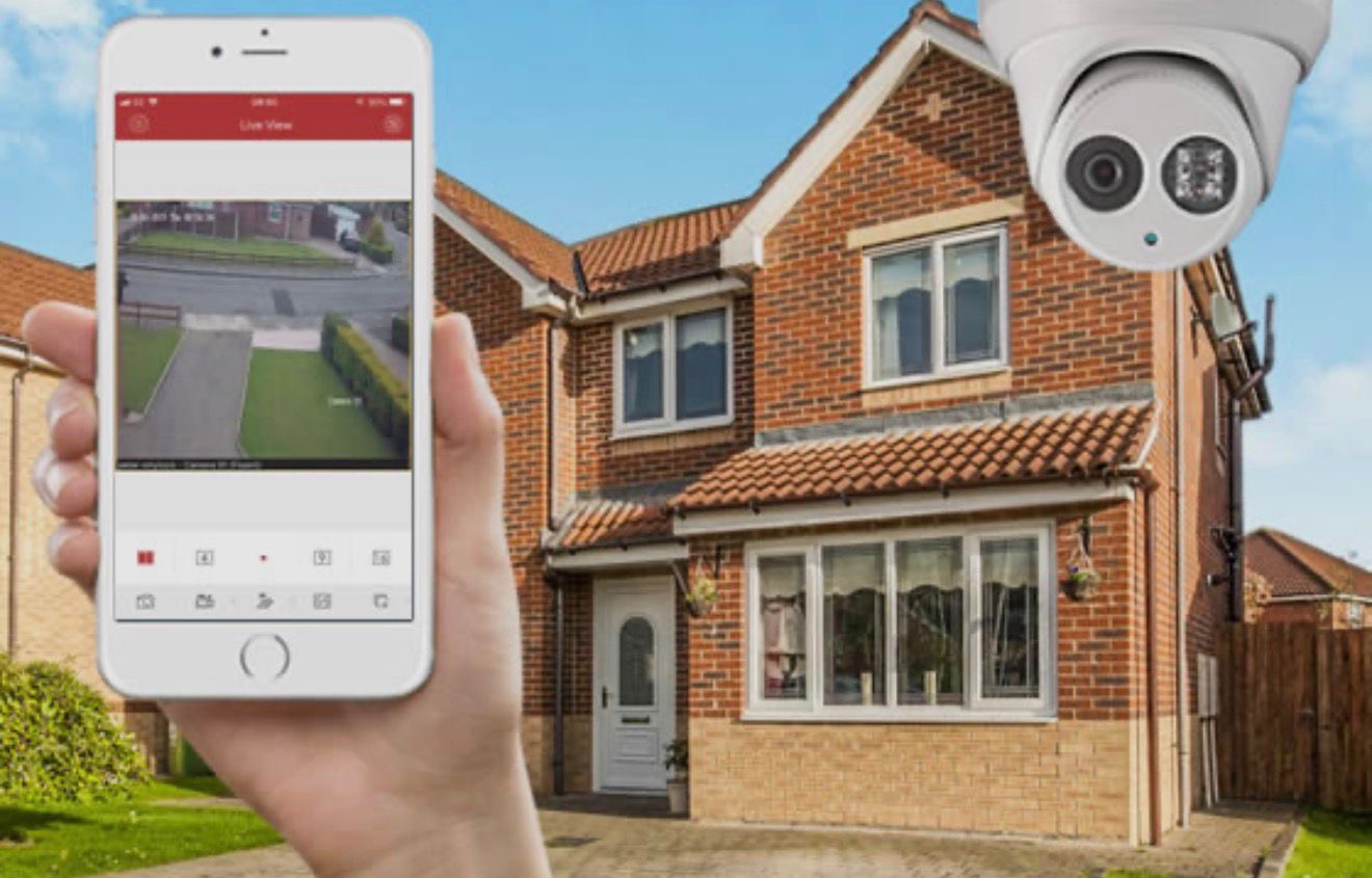 Live CCTV footage of a house being viewed remotely on a mobile phone